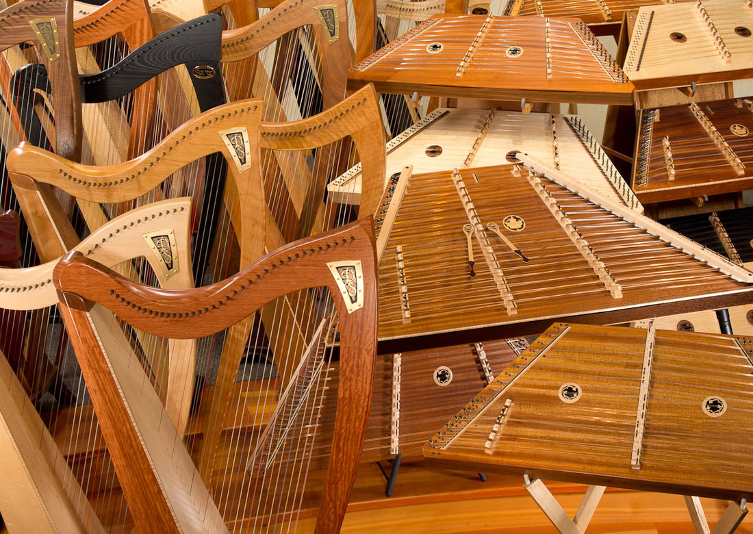 Sea of celtic harps and hammered dulcimers manufactured by Dusty Strings of Seattle, USA